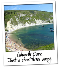 Beautiful Lulworth Cove, a short drive away from Studland Summer Camp